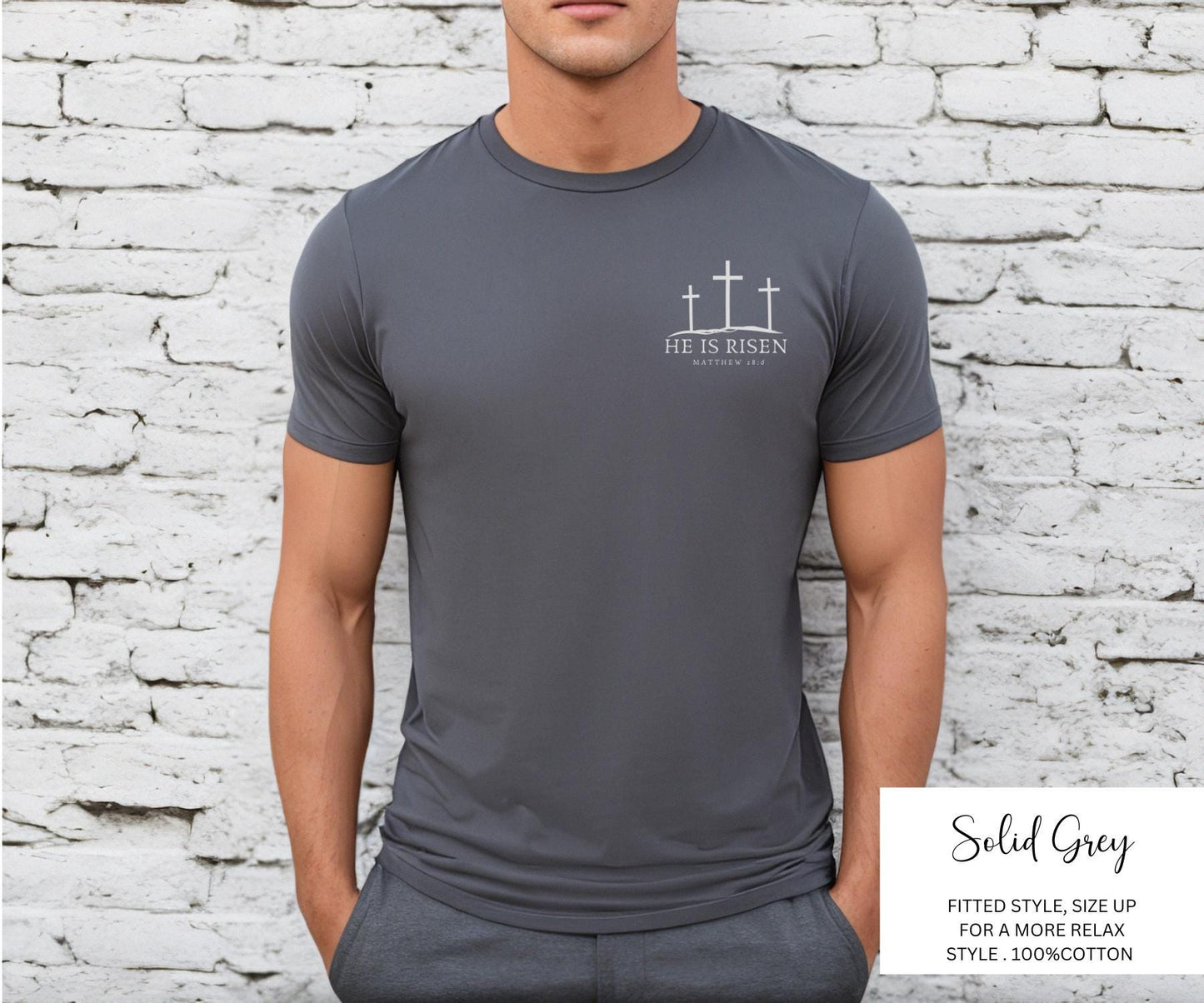 Man wearing a grey He is Risen Men’s Shirt with three cross graphic printed on the front left chest