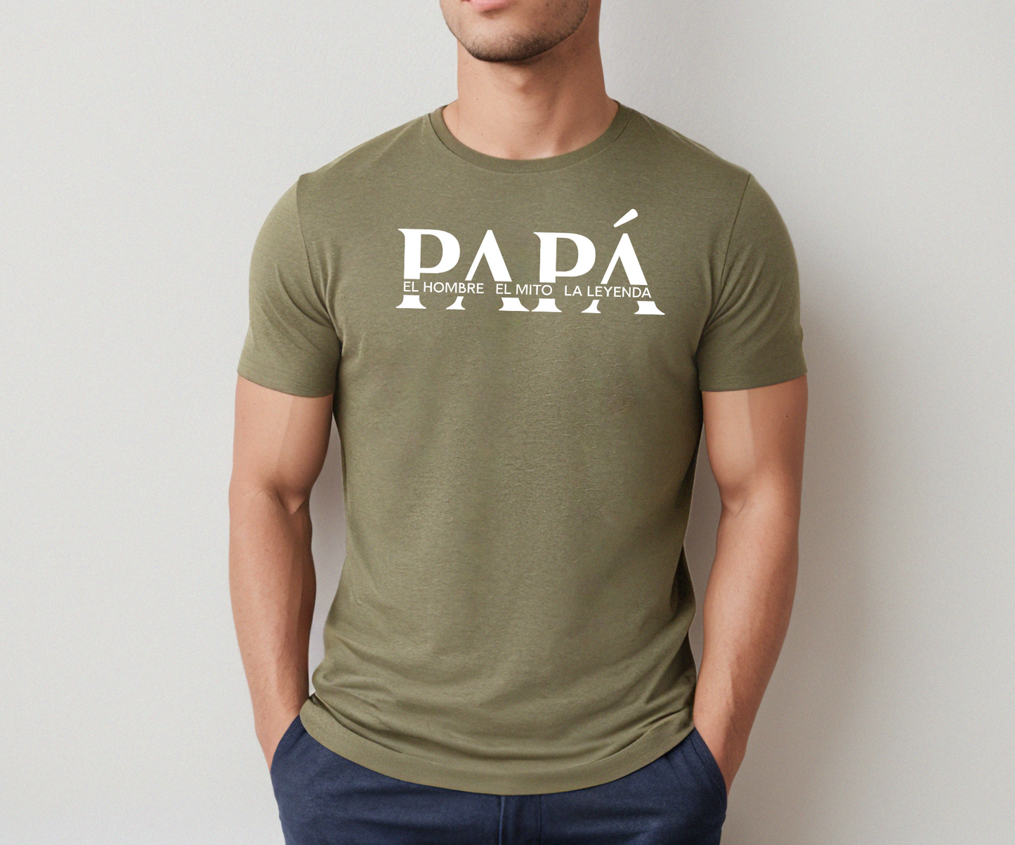 Olive t-shirt with bold white text that reads “PAPÁ – El Hombre, El Mito, La Leyenda,” a perfect Father’s Day gift.