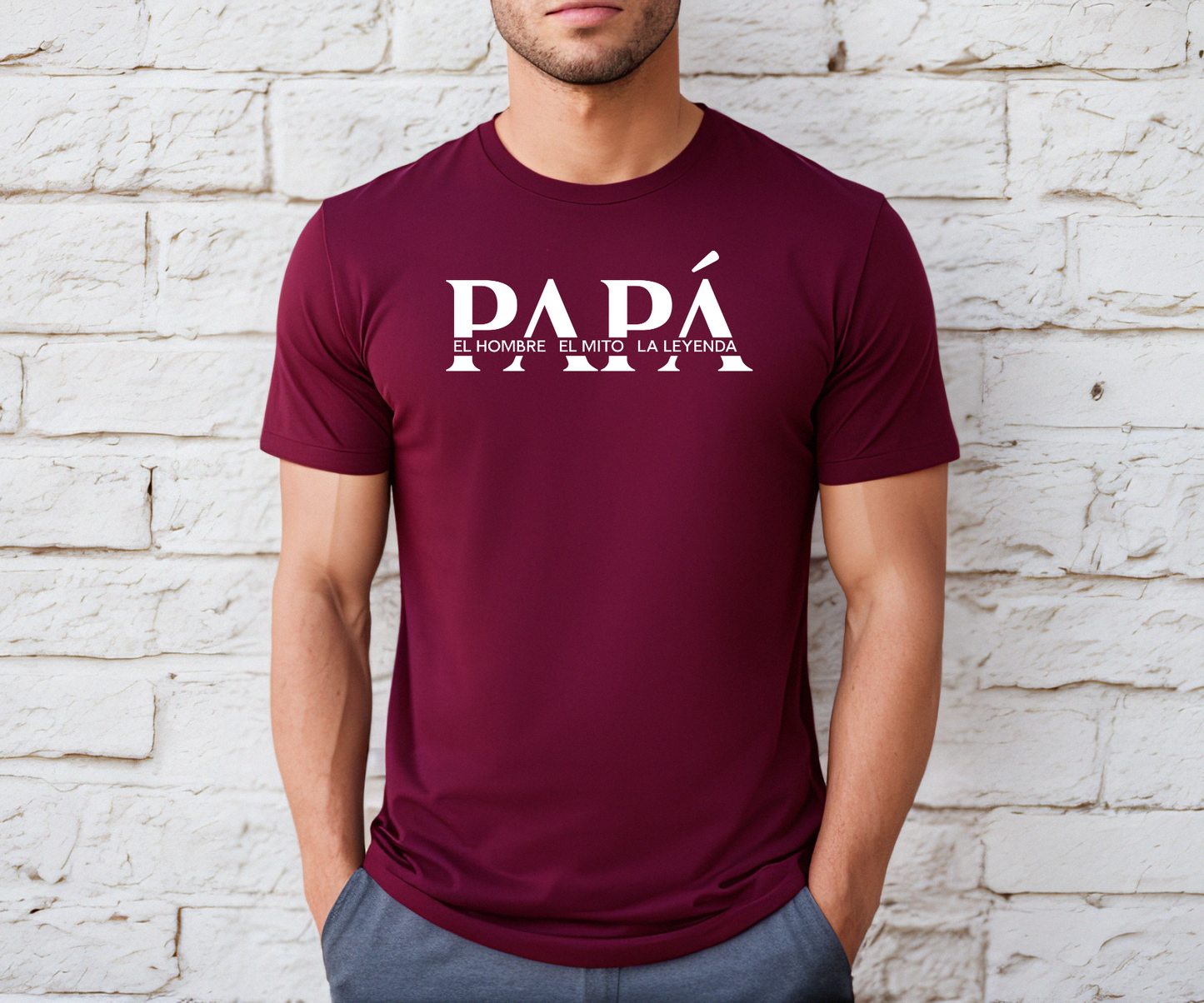 Burgandy t-shirt with bold white text that reads “PAPÁ – El Hombre, El Mito, La Leyenda,” a perfect Father’s Day gift.