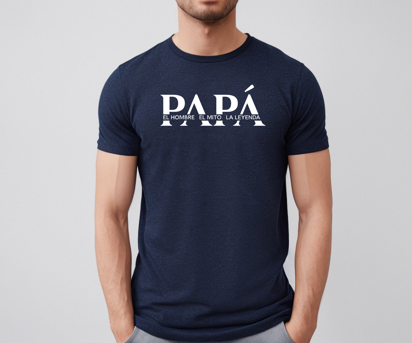 Navy t-shirt with bold white text that reads “PAPÁ – El Hombre, El Mito, La Leyenda,” a perfect Father’s Day gift.