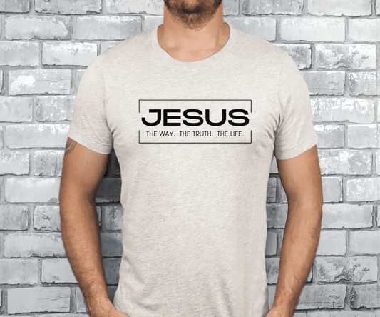 Man wearing a light gray Jesus the Way the Truth the Life shirt