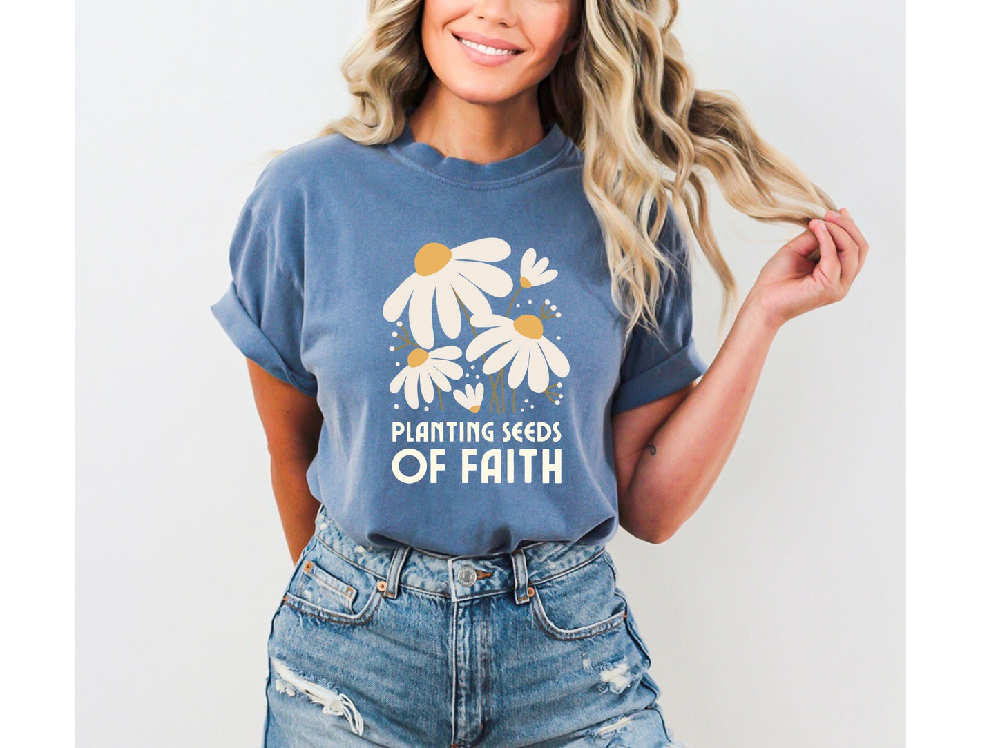 Close-up of Planting Seeds of Faith Shirt design on black Christian tee