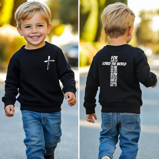 A smelling boy wearing the John 3:16 kids hoodie featuring a white cross design on the chest and John 3:16 scripture printed on the sleeve.
