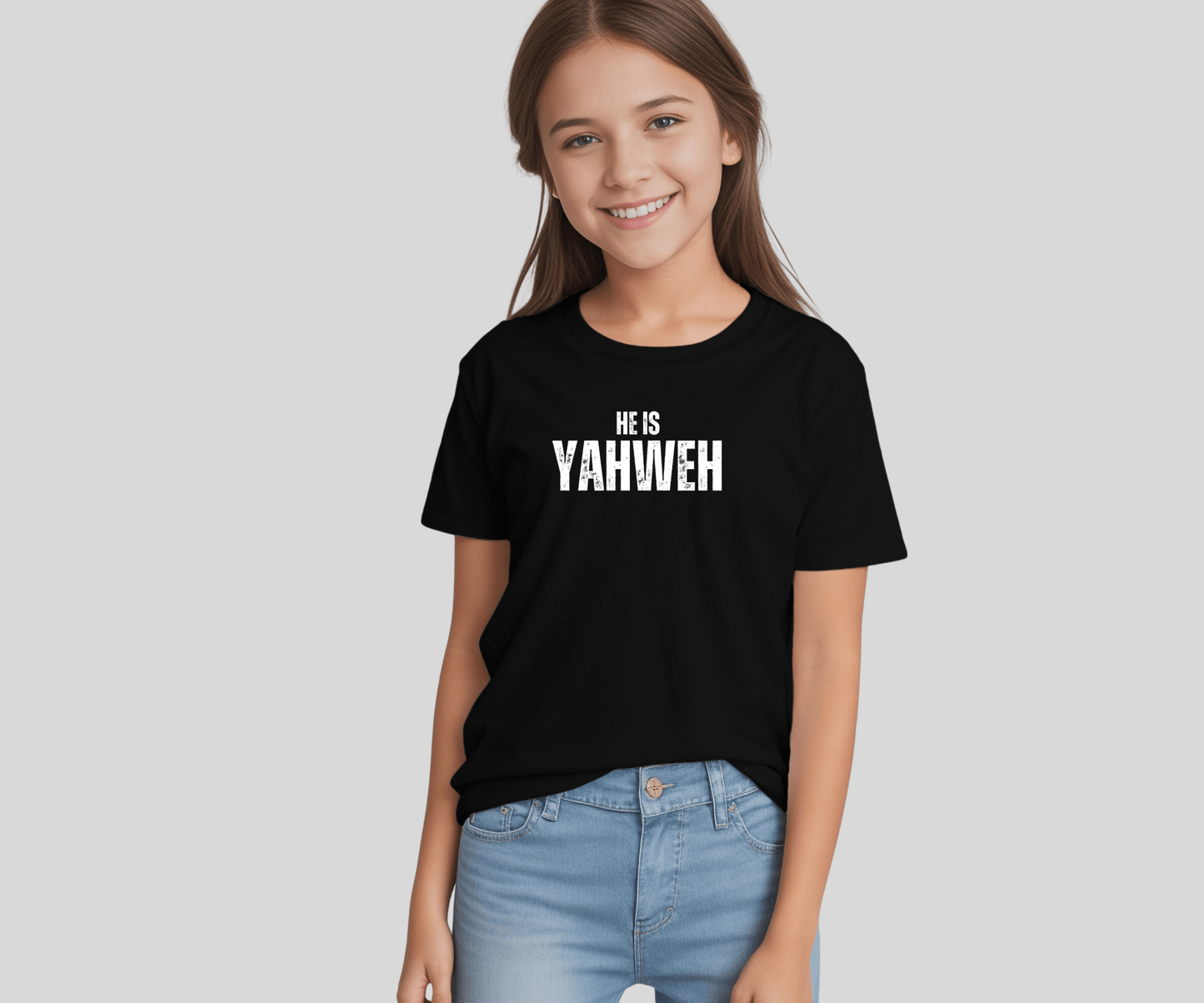 A girl wearing matching black Christian t-shirts with “He Is YAHWEH” text – perfect faith-based apparel for siblings or family outfits