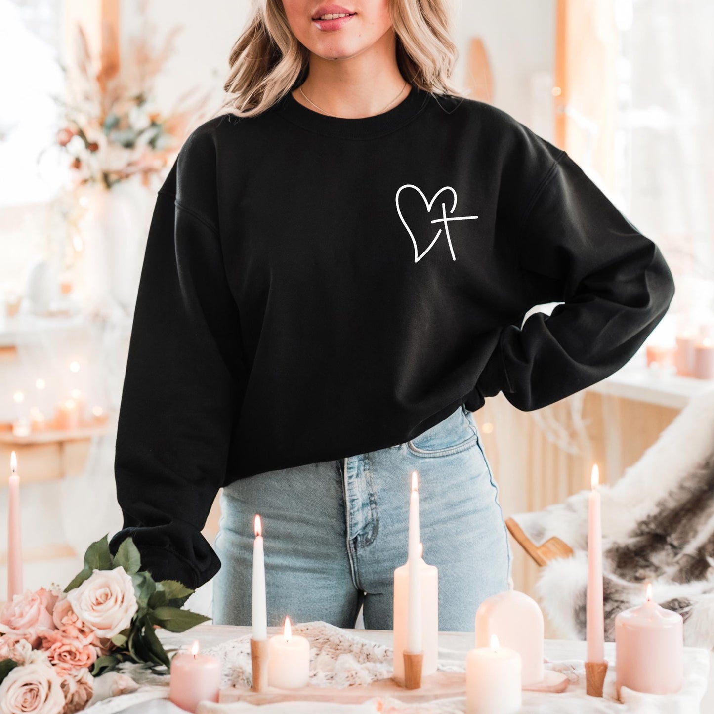 Celebrate Valentine's Day with our Heart and Cross Sweatshirt – a perfect blend of love and faith! Black Sweatshirt