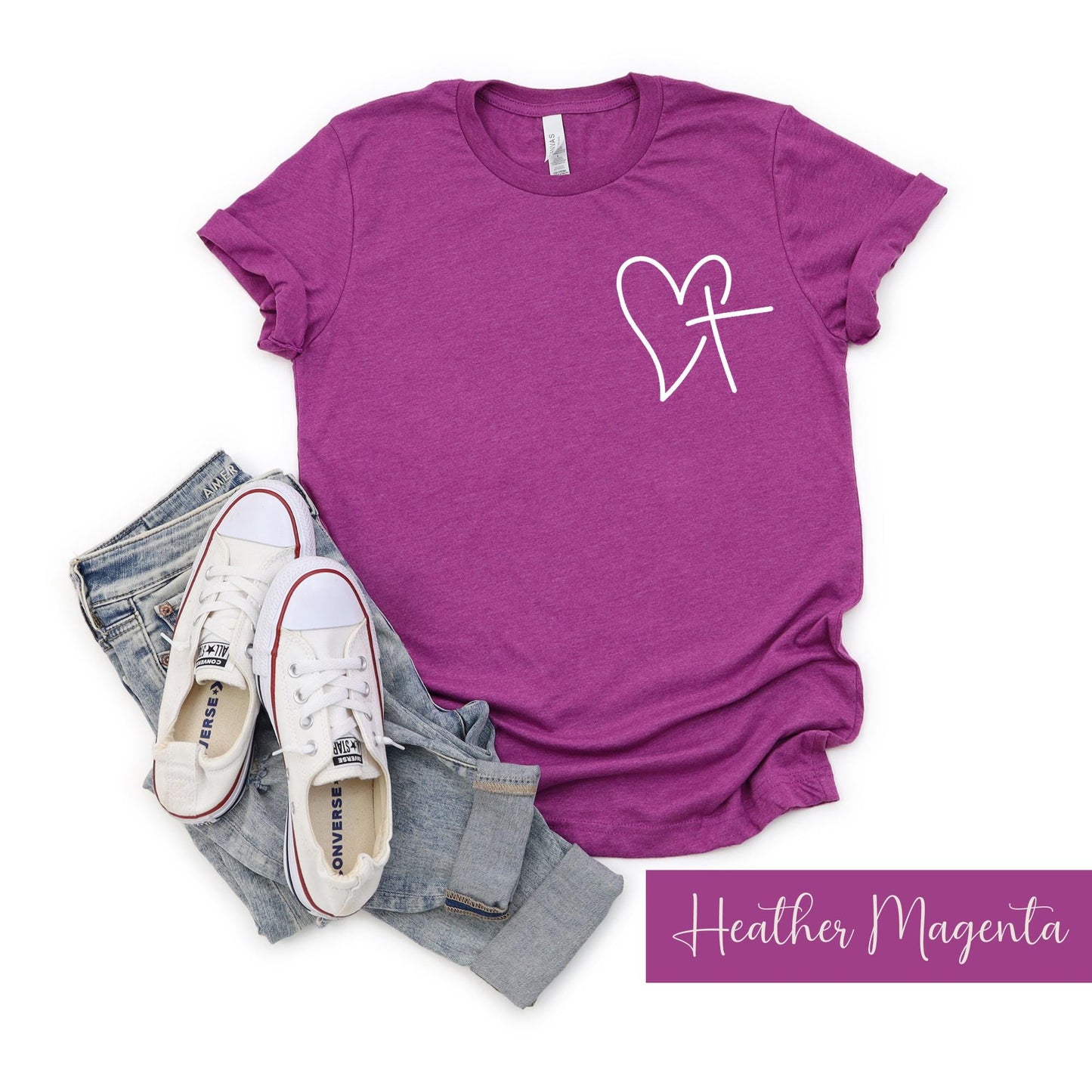 Celebrate Valentine's Day with our Heart and Cross Sweatshirt – a perfect blend of love and faith!Heather Magenta Tshirt
