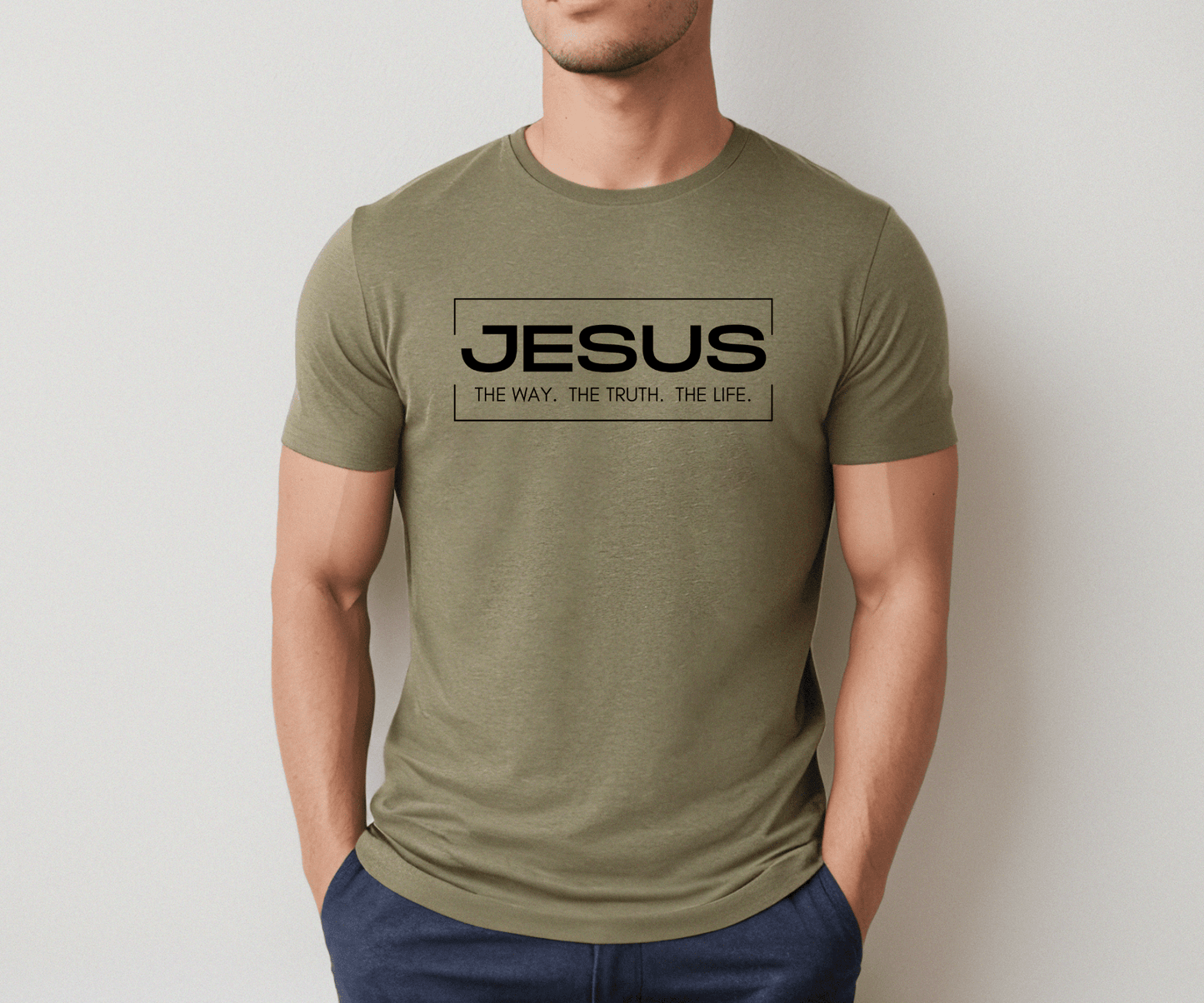Man wearing a heather olive Jesus the Way the Truth the Life shirt
