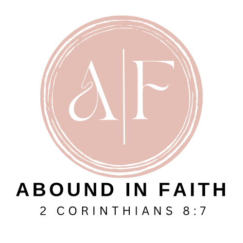 Abound in Faith logo, in a soft pink circle with white letters. 