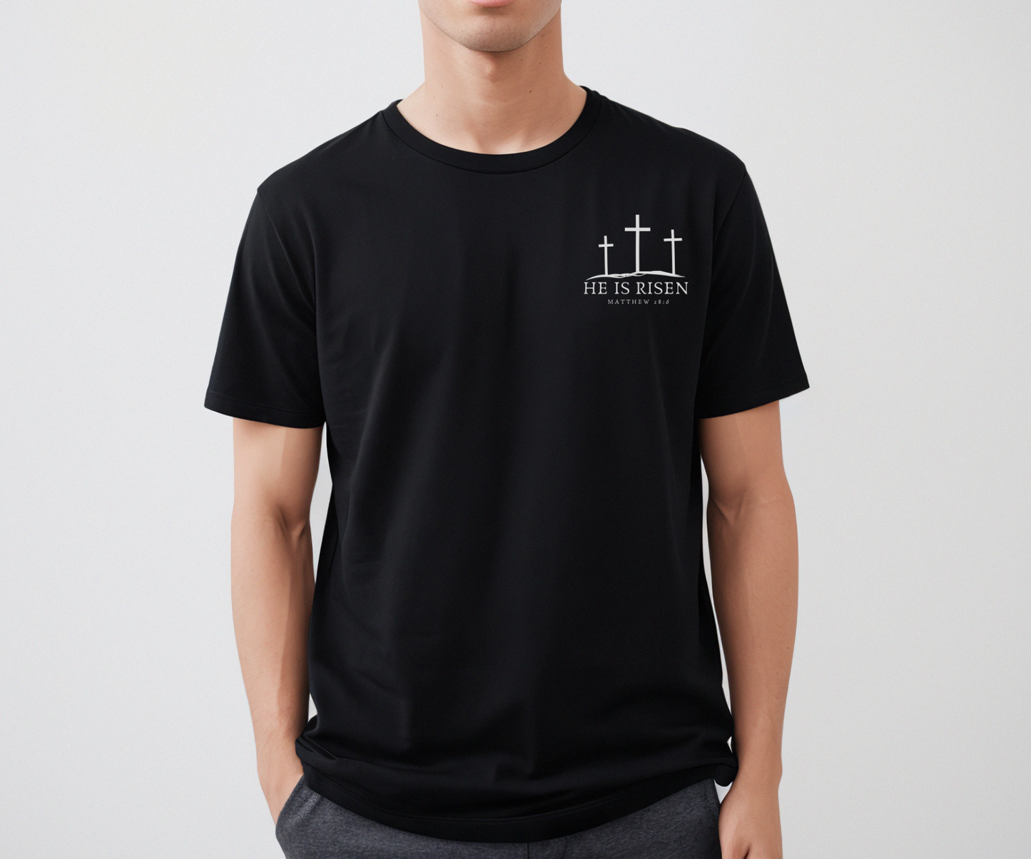  "He Is Risen Men's Christian T-Shirt, screen printed design on super soft fabric, in colors heather dust, white, and black"