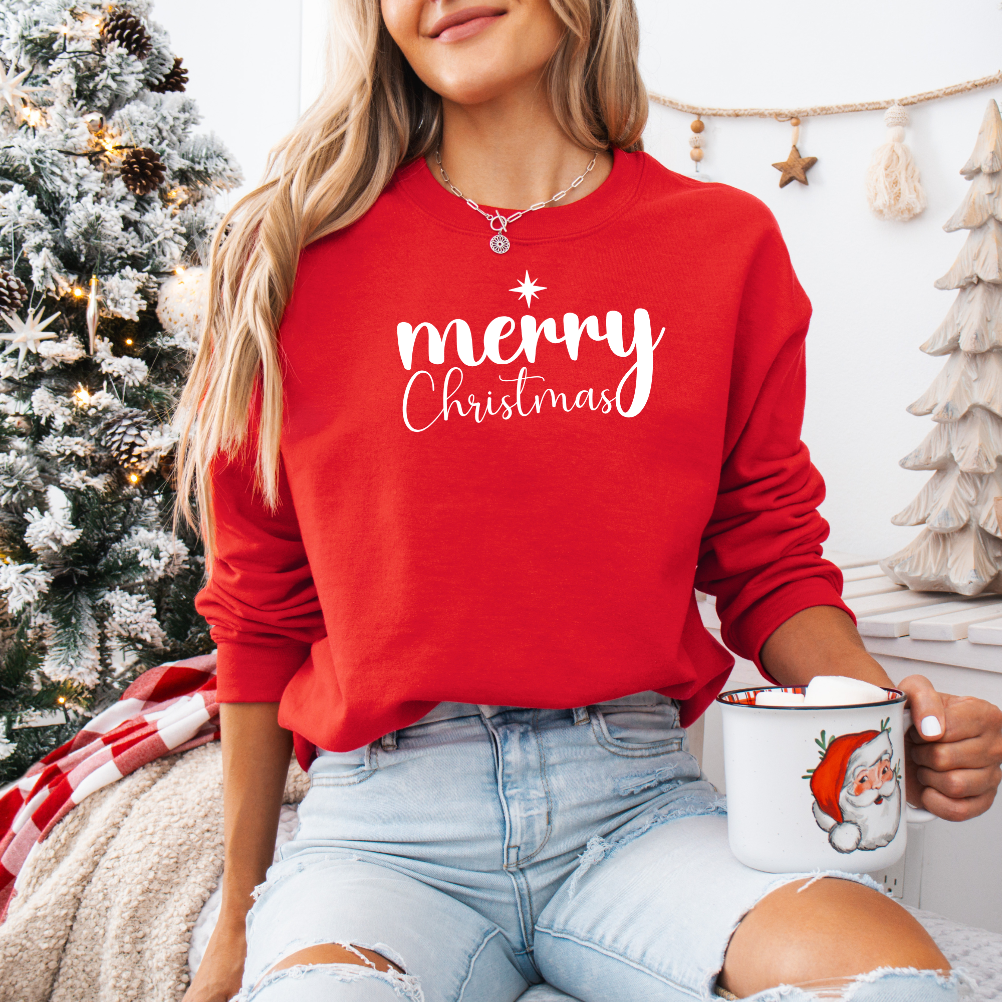 Celebrate the season in style! Our 'Merry Christmas' red sweatshirt with puff ink design.