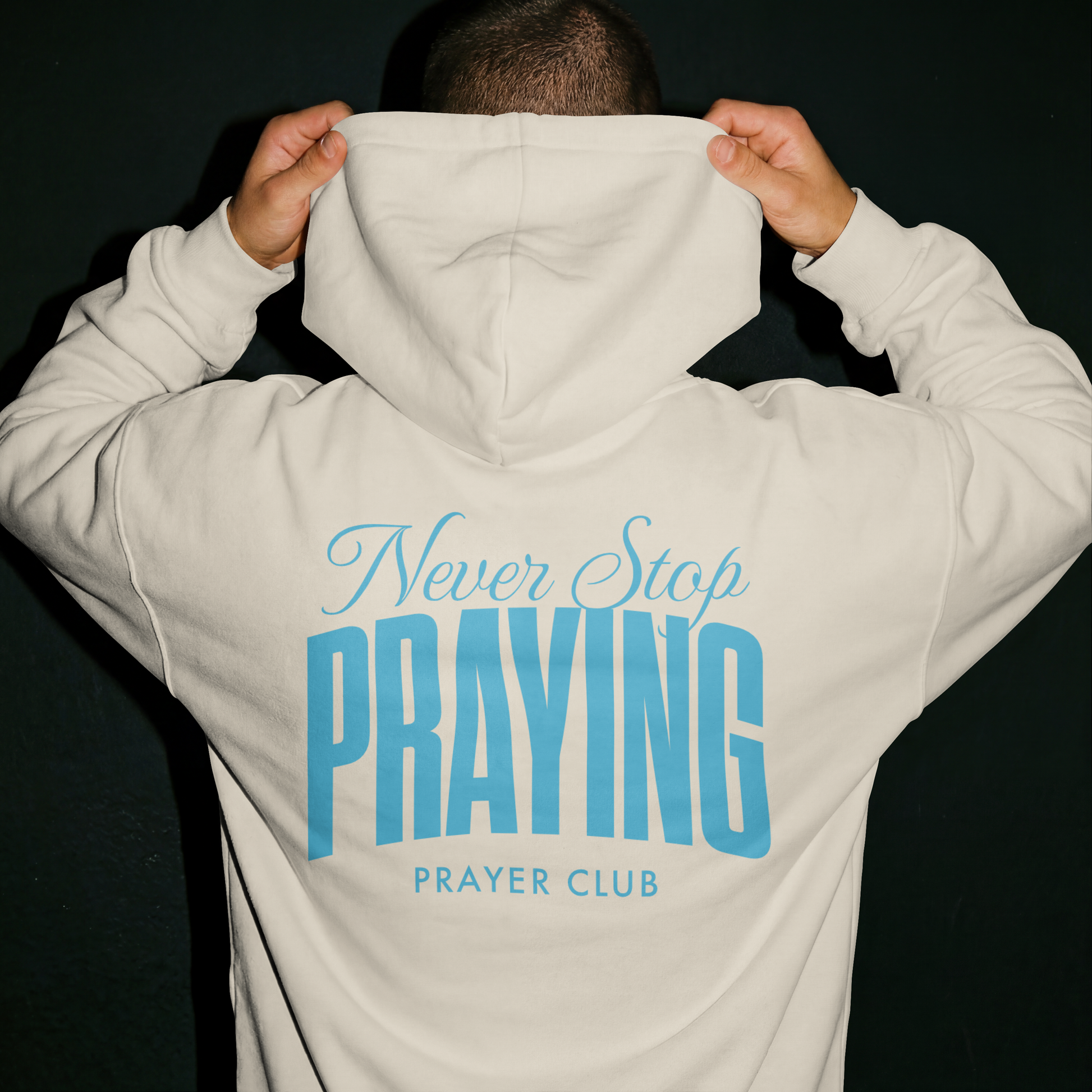 Never Stop Praying hoodie back blue ink Bone - Abound in Faith