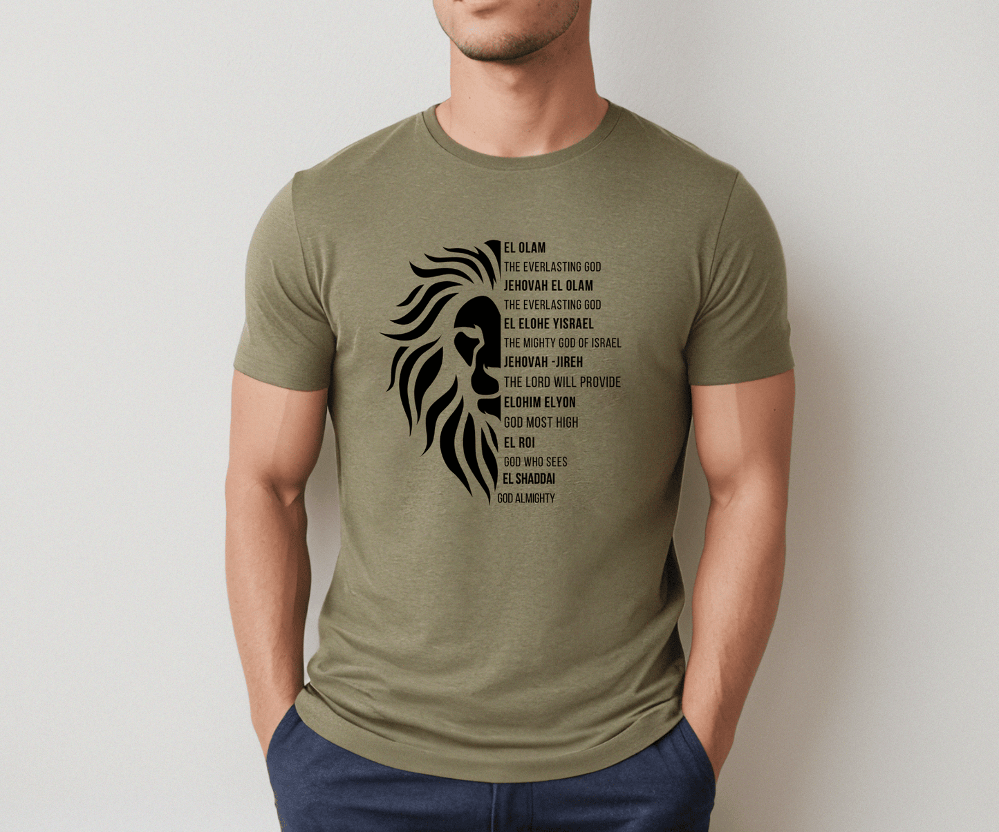 Man wearing a heather Olive Christian t-shirt featuring a lion silhouette and a list of biblical names of God, including El Olam, Jehovah Jireh, and El Shaddai