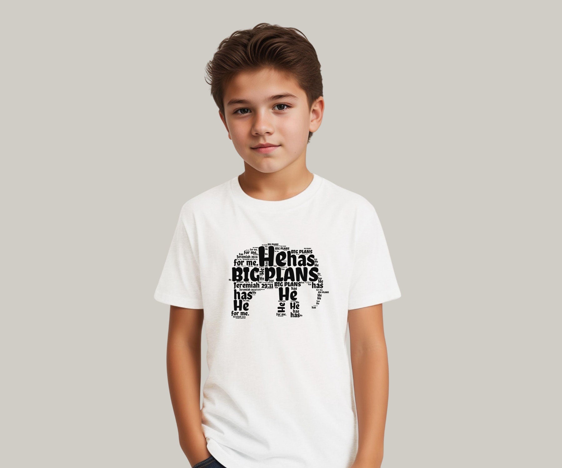 He Has Big Plans for me boys christian shirt. White tee and black letters forming a elephant.